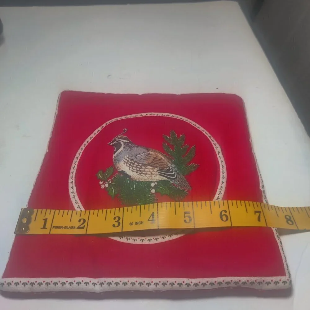 Hotpad detailed with a lifelike Quail on a red background. Quaint and beautiful.
